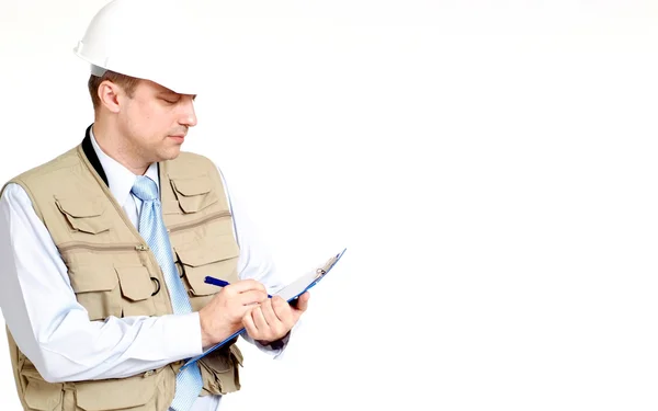 Ernstige man aan het werk in de bouw helm — Stockfoto