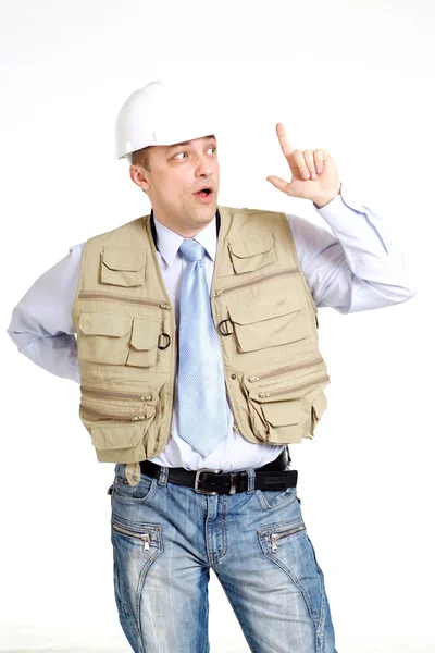 Surprised man working in the construction helmet — Stock Photo, Image