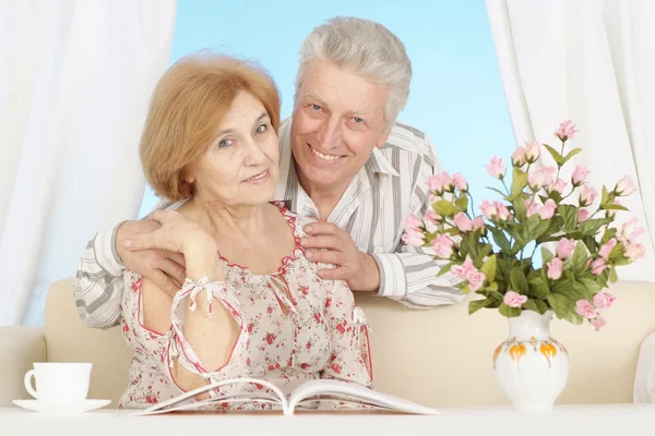 Beautiful elderly couple resting at home — Stock Photo, Image