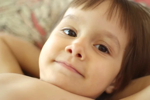 Nice little girl in bed — Stock Photo, Image