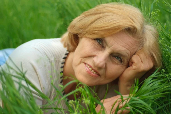 Adorable female enjoys union with nature — Stock Photo, Image