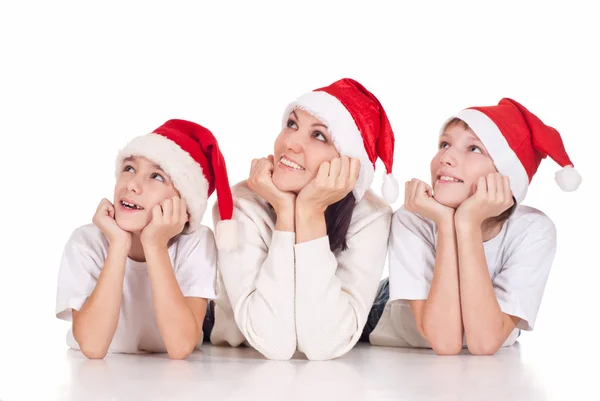 Santa şapka ve aile — Stok fotoğraf