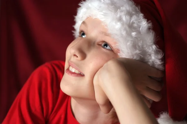 Щаслива дитина в капелюсі Санта — стокове фото