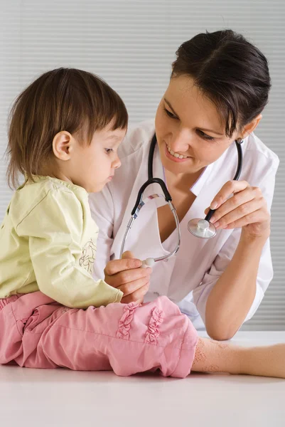 Doctor and kid Royalty Free Stock Photos