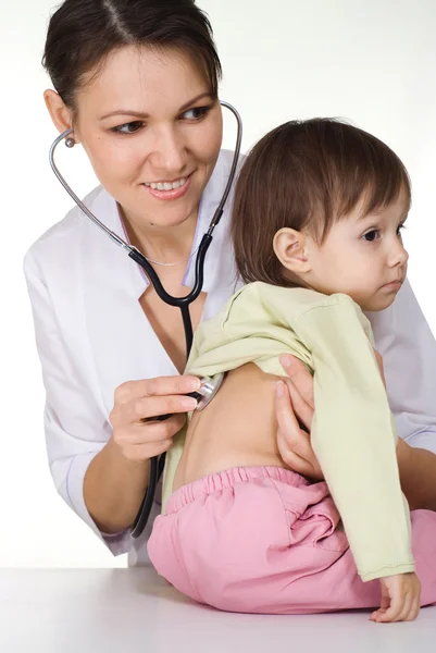 Doctor works with kid Stock Picture