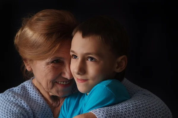 Pretty Caucasian grandmother with her grandson — Stock Photo, Image