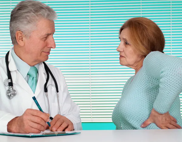 Fine doctor and his patient — Stock Photo, Image
