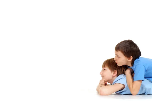 Two boys looking in the direction — Stock Photo, Image