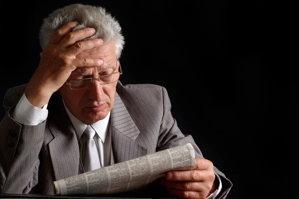 Worried old man in suit — Stock Photo, Image