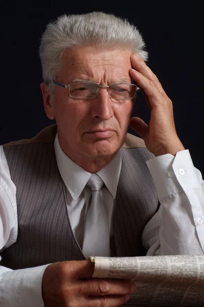 Upset old man in suit — Stock Photo, Image