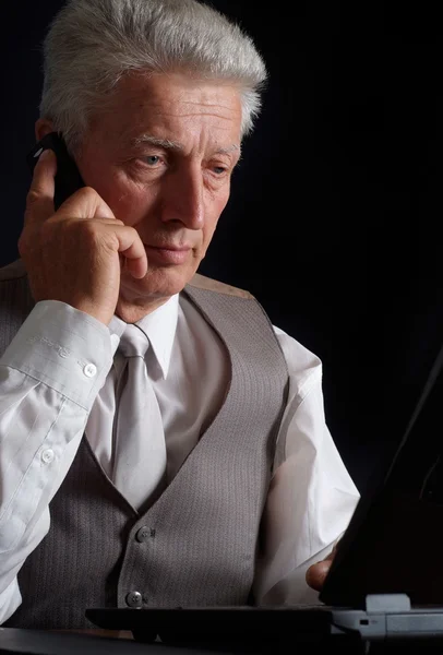 Talking mature man in suit — Stock Photo, Image