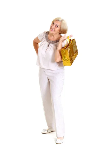 Nice old woman with shopping — Stock Photo, Image