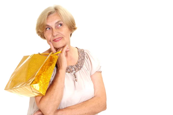 Sympothetic old woman with shopping — Stock Photo, Image