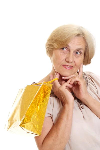 Charming old woman with shopping — Stock Photo, Image