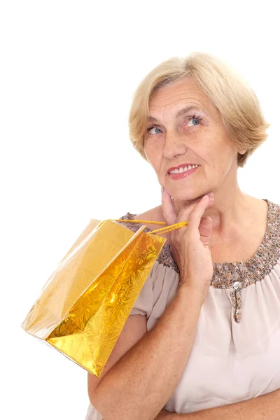 Good-looking old woman with shopping — Stock Photo, Image