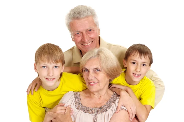 Mor-och farföräldrar med sina barnbarn — Stockfoto