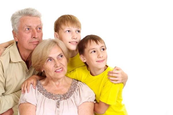 Großeltern mit ihren schönen Enkeln — Stockfoto