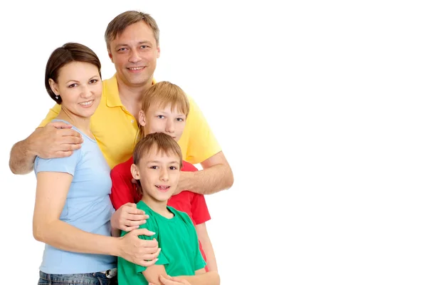 Família atraente em camisetas brilhantes — Fotografia de Stock