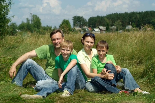 Lachende familie plezier — Stockfoto