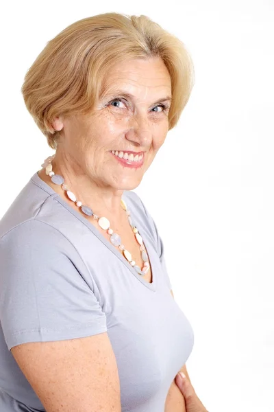 Sorrindo velha senhora em casa — Fotografia de Stock