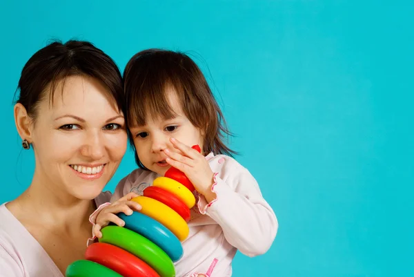 Lächeln kaukasische Dame mit einem Kind — Stockfoto