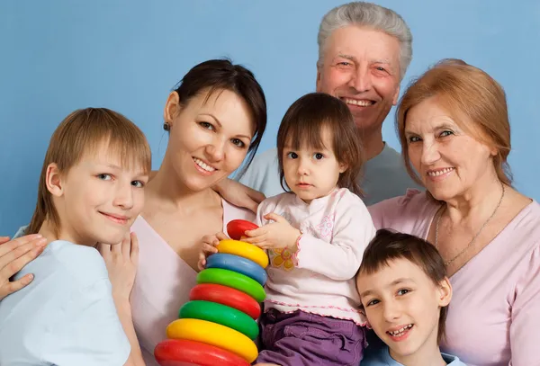 Pretty Caucasian happy family standing — Stock Photo, Image