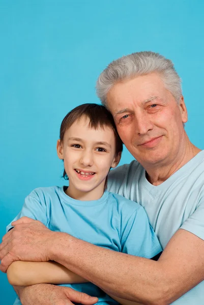 Caucasian aged man with a boy — Stock Photo, Image