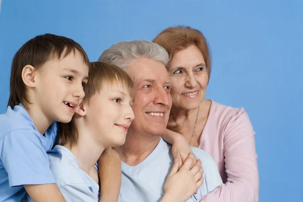 A happy family of four — Stock Photo, Image