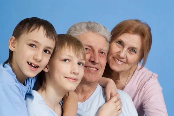 A happy family of four — Stock Photo, Image