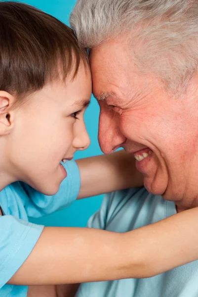 Caucasian elderly male with a boy Stock Photo