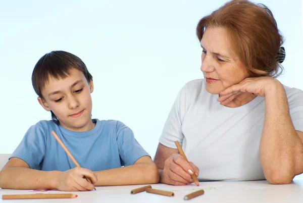 Caucasian pretty grandmother with grandchildren — Stock Photo, Image