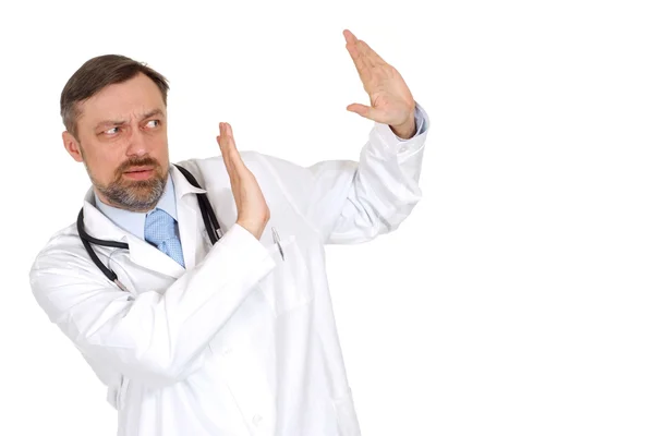 Zdenerwowany mężczyzna lekarz w gabinecie — Zdjęcie stockowe