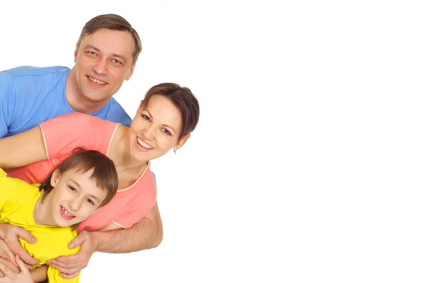 Мила сім'я в яскравих футболках — стокове фото