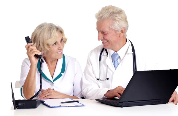 Doctors with a laptop on a white — Stock Photo, Image