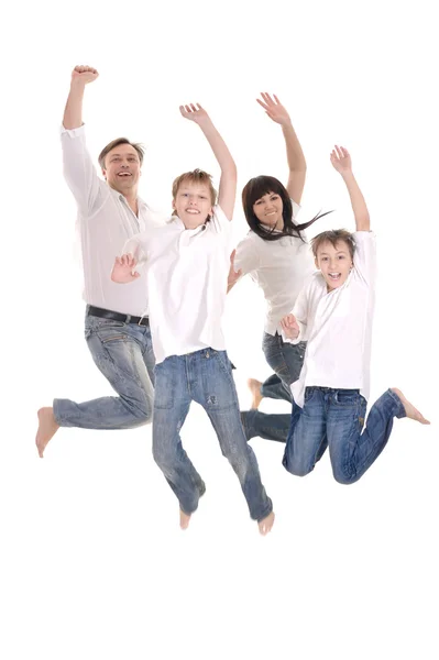 Cheerful family jumping — Stock Photo, Image