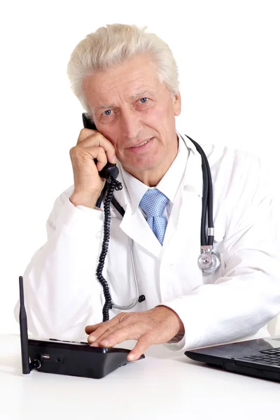 Old doctor writing — Stock Photo, Image