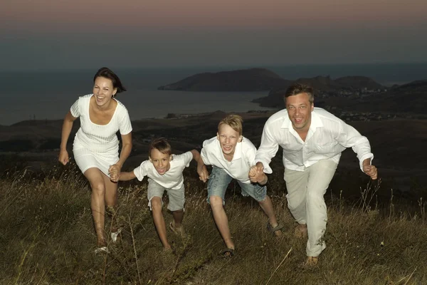 Friendly family of four — Stock Photo, Image