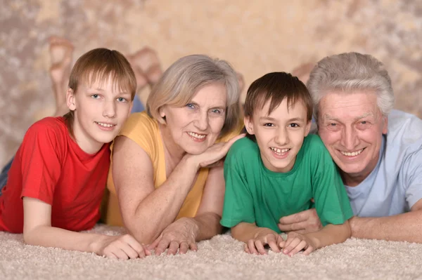 Couple and their grandchildren — Stock Photo, Image