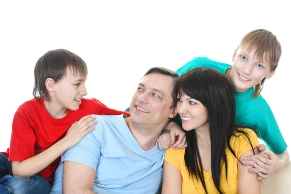 Сім'я в кольорових футболках — стокове фото