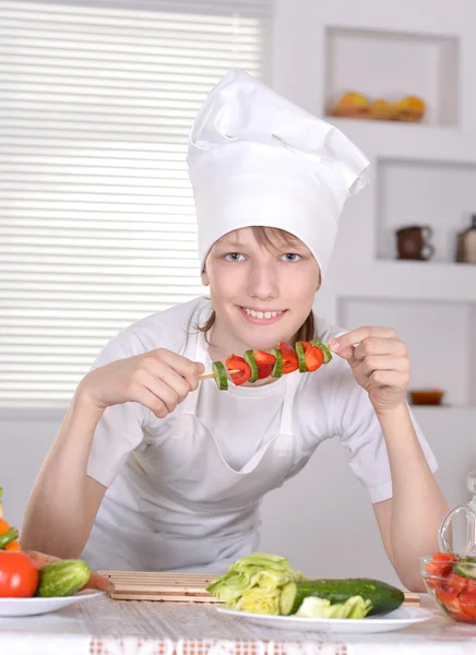 Boy preparing meals — Stock Photo, Image