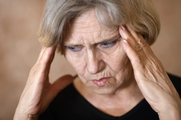 Woman with a headache — Stock Photo, Image