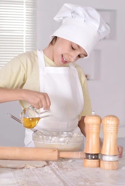 Boy knead the dough — Stock Photo, Image