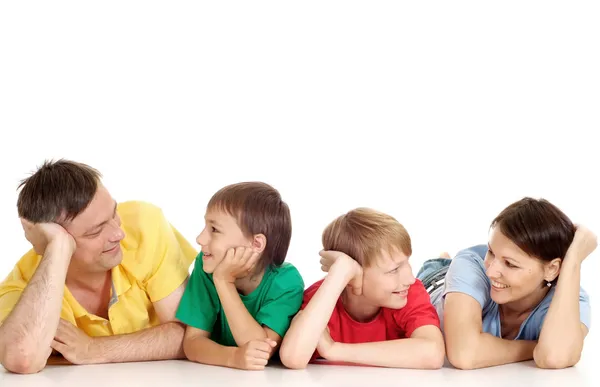 Thoughtful family in bright T-shirts — Stock Photo, Image