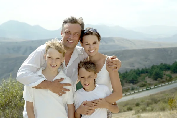 Familia feliz en la mañana — Foto de Stock