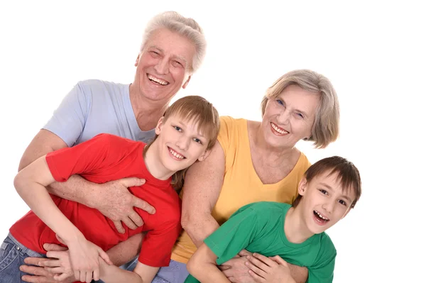 Vrolijke grootouders en kleinkinderen — Stockfoto