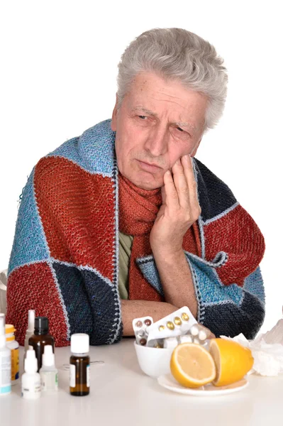 Elderly caucasian man treated by medicines — Stock Photo, Image