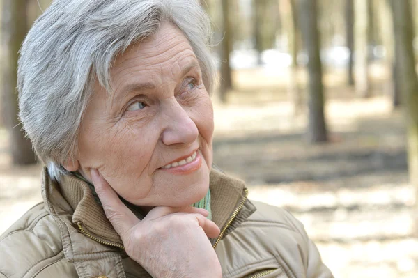 Pensive elder woman — Stock Photo, Image