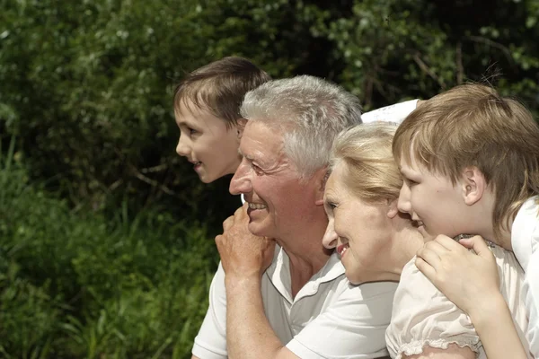 Attractive family went to the river — Stock Photo, Image