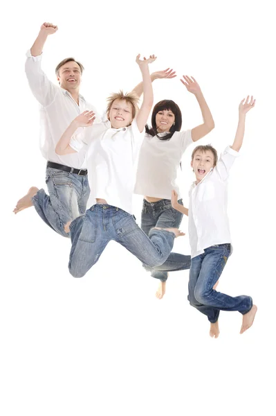 Vrolijke familie springen — Stockfoto