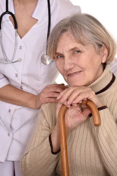 Mujer caucásica con un médico — Foto de Stock